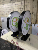 LETRERO REDONDO DOBLE CARA CON ILUMINACIÓN